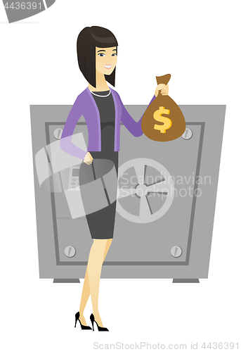 Image of Asian business woman holding a money bag.