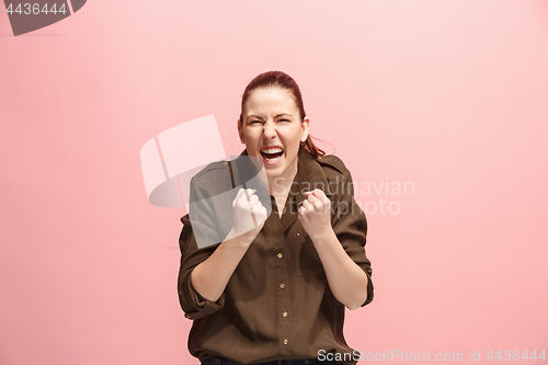 Image of Winning success woman happy ecstatic celebrating being a winner. Dynamic energetic image of female model