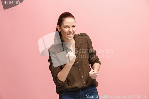 Image of Winning success woman happy ecstatic celebrating being a winner. Dynamic energetic image of female model