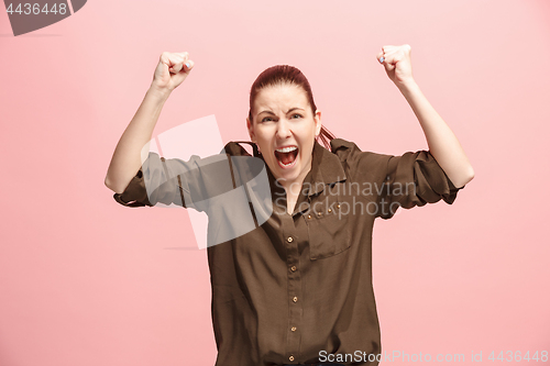 Image of Winning success woman happy ecstatic celebrating being a winner. Dynamic energetic image of female model