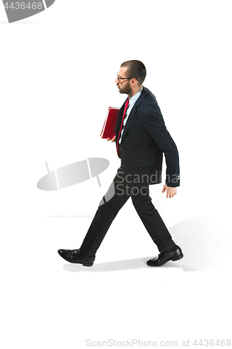 Image of Full body portrait of businessman with folder on white