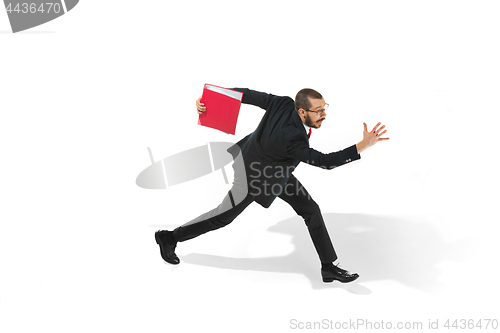 Image of Businessman running with a folder on white background