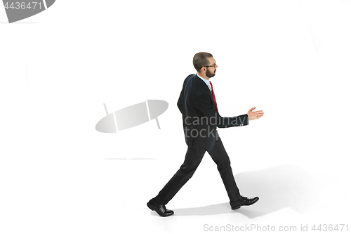 Image of Full body portrait of businessman with folder on white