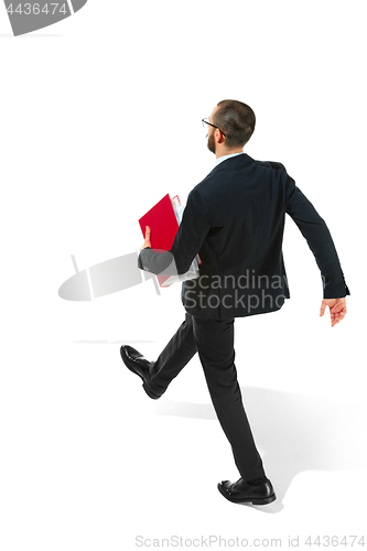 Image of Full body portrait of businessman with folder on white