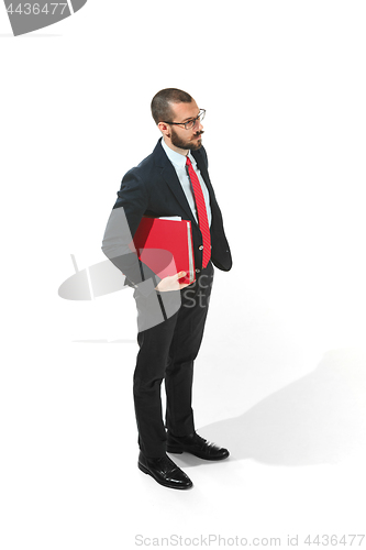 Image of Full body portrait of businessman with folder on white