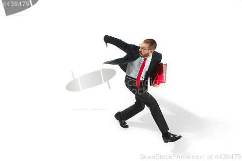 Image of Businessman running with a folder on white background