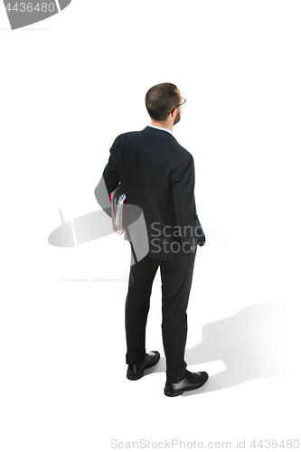 Image of Full body portrait of businessman with folder on white