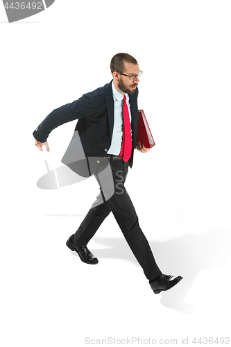 Image of Full body portrait of businessman with folder on white