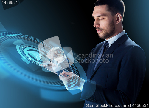 Image of businessman with tablet pc and ethereum hologram