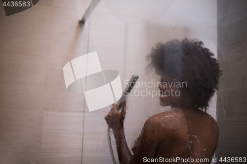 Image of African American woman in the shower