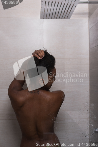 Image of African American woman in the shower