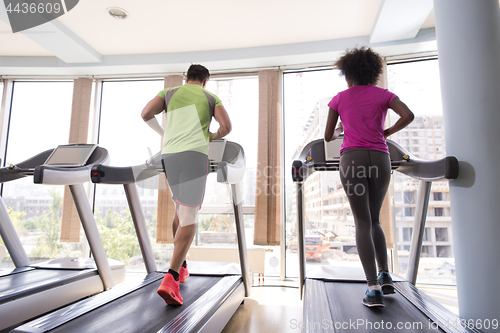 Image of people exercisinng a cardio on treadmill in gym