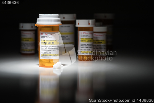 Image of Hydrocodone Pills and Prescription Bottles with Non Proprietary 