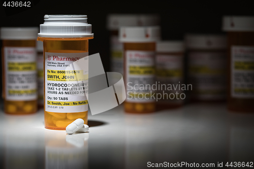 Image of Hydrocodone Pills and Prescription Bottles with Non Proprietary 