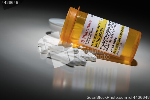 Image of Hydrocodone Pills and Prescription Bottle with Non Proprietary L