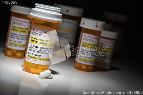 Image of Hydrocodone Pills and Prescription Bottles with Non Proprietary 