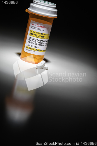 Image of Hydrocodone Pills and Prescription Bottle with Non Proprietary L