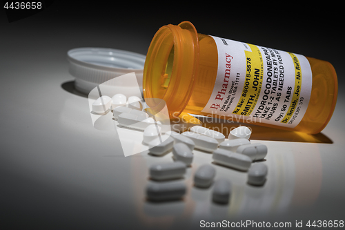 Image of Hydrocodone Pills and Prescription Bottle with Non Proprietary L