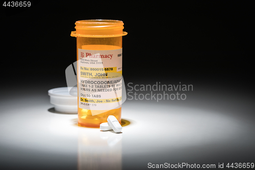 Image of Hydrocodone Pills and Prescription Bottle with Non Proprietary L