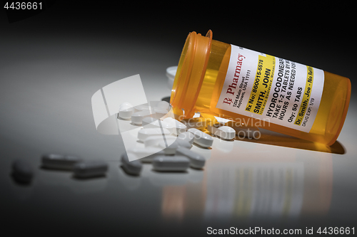 Image of Hydrocodone Pills and Prescription Bottle with Non Proprietary L