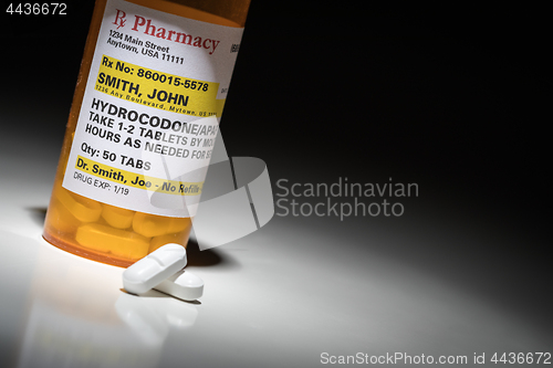 Image of Hydrocodone Pills and Prescription Bottle with Non Proprietary L