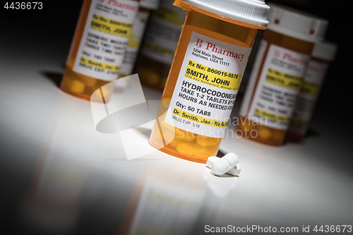 Image of Hydrocodone Pills and Prescription Bottles with Non Proprietary 