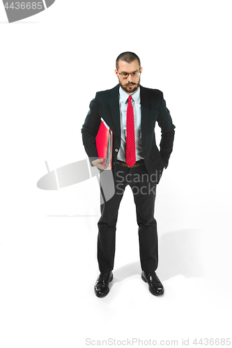 Image of Full body portrait of businessman with folder on white