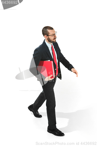 Image of Full body portrait of businessman with folder on white