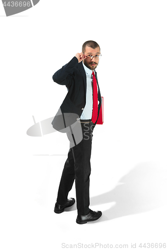 Image of Full body portrait of businessman with folder on white