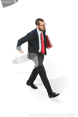 Image of Full body portrait of businessman with folder on white