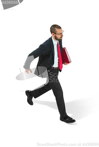 Image of Full body portrait of businessman with folder on white