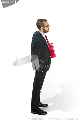 Image of Full body portrait of businessman with folder on white