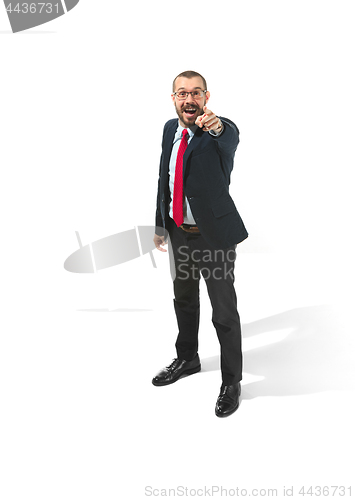 Image of Full body portrait of happy businessman pointing to camera on white