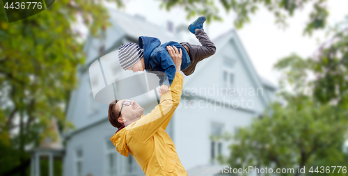 Image of father with son playing and having fun outdoors