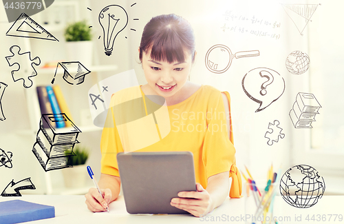 Image of asian woman student with tablet pc at home