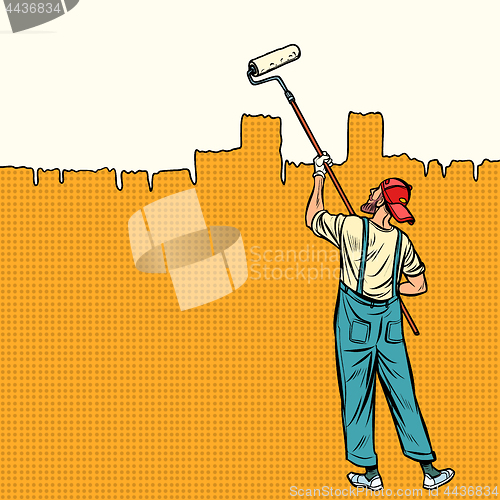 Image of painter paints the wall at the top