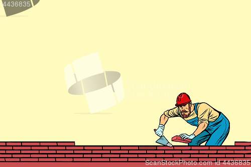 Image of The Builder lays brick masonry below