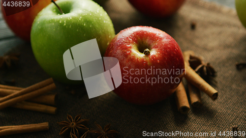 Image of Apples and spices on table 