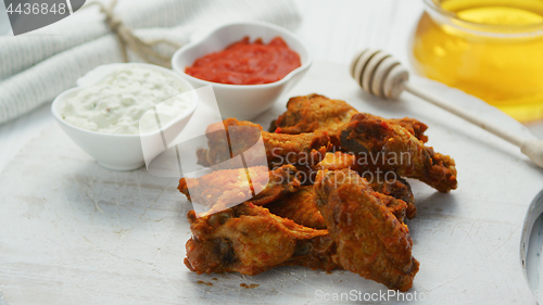 Image of Fried chicken wings in served