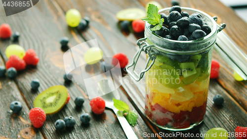 Image of Assortment of fruits in jar 