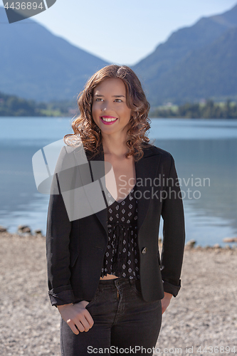 Image of Young woman at the lake