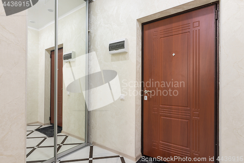 Image of Sliding wardrobe in the hallway of a small apartment