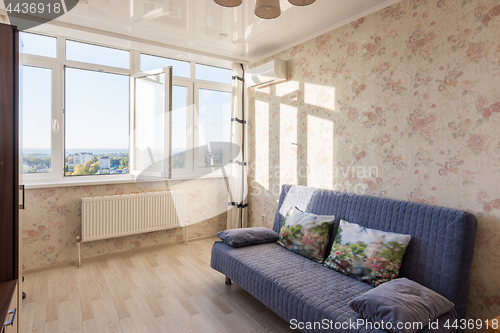 Image of Interior of a living room with a good view from the window