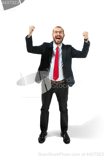 Image of Winning success man happy ecstatic celebrating being a winner. Dynamic energetic image of male model