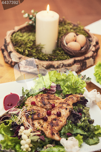 Image of quail roasted with sweet and sour cranberry sauce