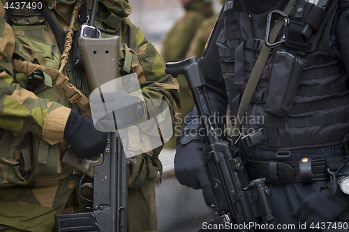 Image of Norwegian Soldier and Norwegian Police