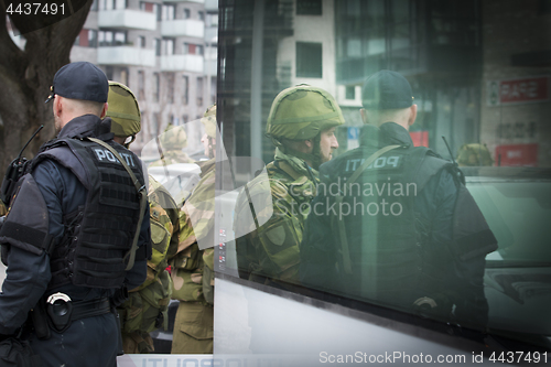 Image of Norwegian Soldier and Norwegian Police