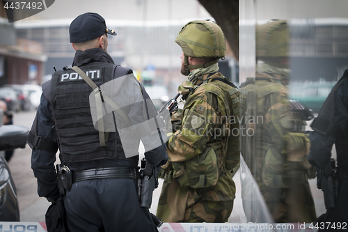 Image of Norwegian Soldier and Norwegian Police