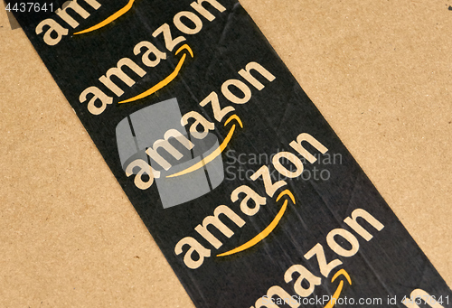 Image of Amazon shipping box with branded tape.