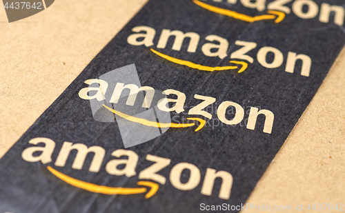 Image of Amazon shipping box with branded tape.